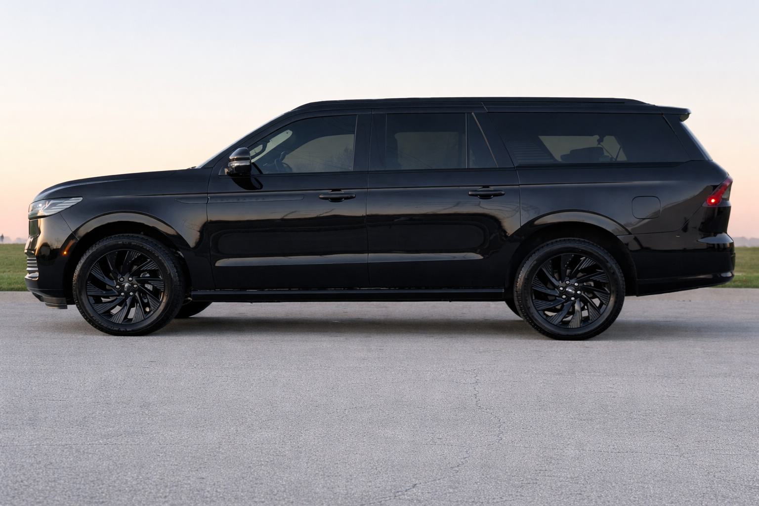 Black full-size SUV parked on pavement